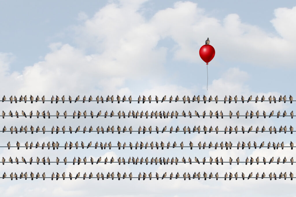 Birds on a wire with red balloon on The Memoir Writing Workbook page