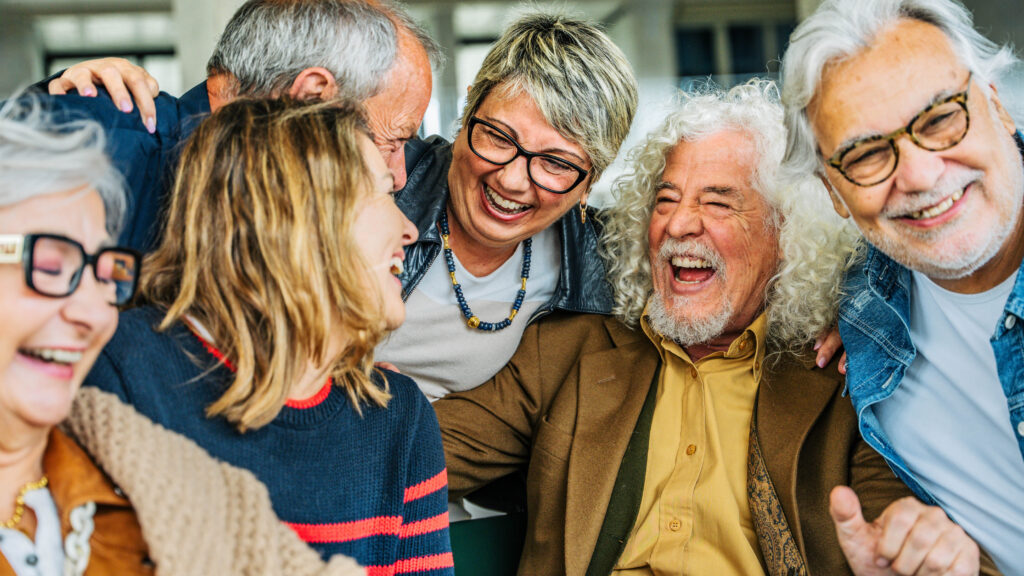 Start a Memoir Writing Club happy group of senior people laughing